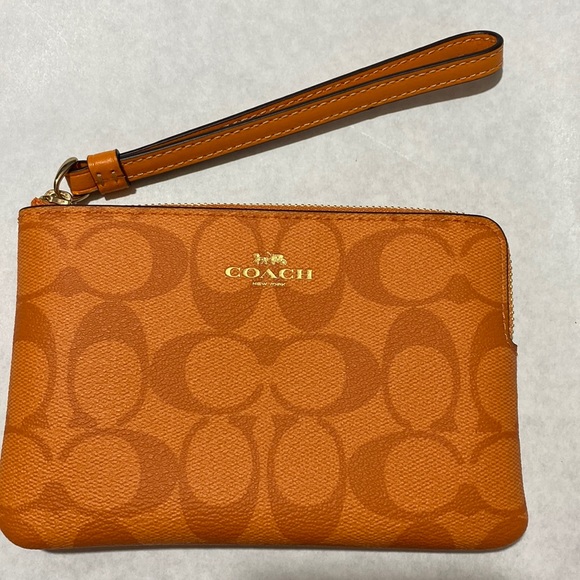 Coach Handbags - Coach Signature Light Orange Corner Zip Wristlet NWT